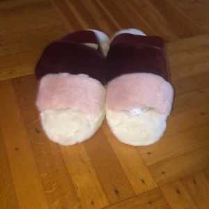Brand new! Cozy plush faux fur slippers with elastic back strap . Fits size 7-8.